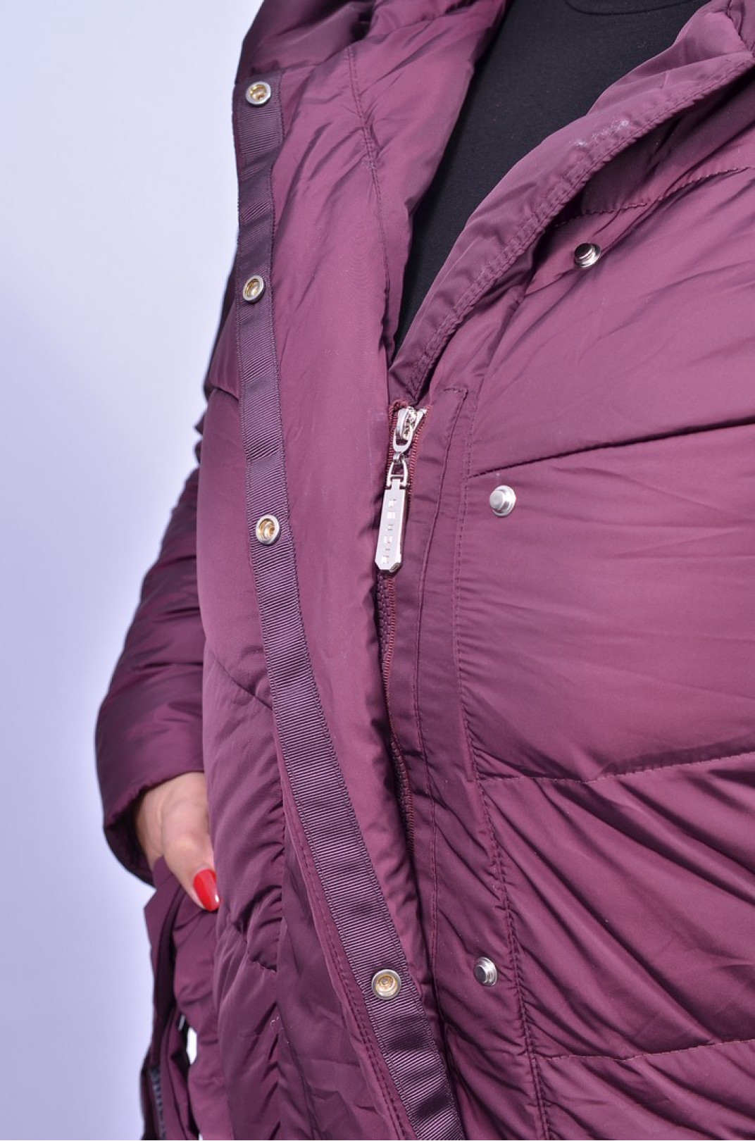 Пальто зимове стьобане з блискавкою та кнопками