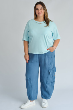 Брюки банани кольору денім з накладною кишенею великих розмірів