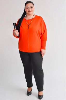 Брюки завужені в чорному кольорі з невеликими розрізами великих розмірів