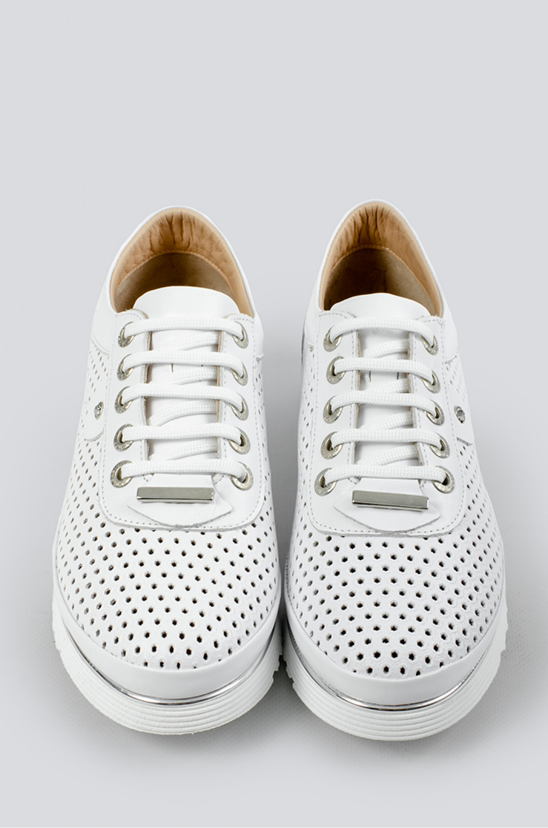 Білі кросівки з перфорованої шкіри великих розмірів