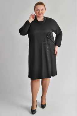 Чорна елегантна сукня з декоративними акцентами великих розмірів