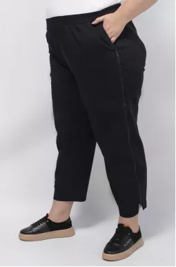 Стильні брюки банани декоровані блискавками супер батал