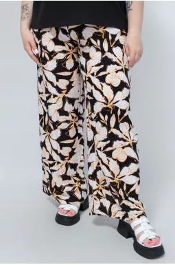 Штапельные брюки клеш в цветочный принт батал