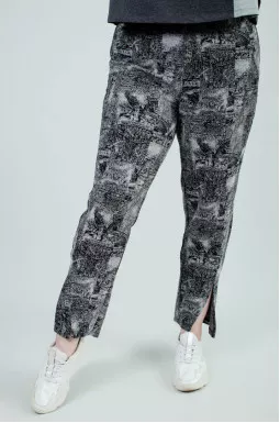 Брюки завужені в принт з розрізами батал