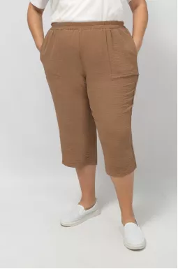 Капрі однотонні із жатки великих розмірів