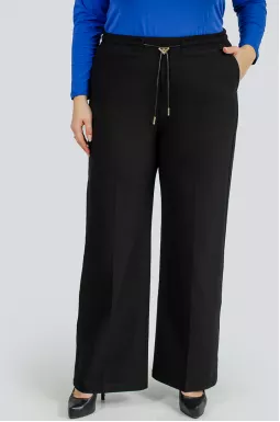 Елегантні чорні брюки зі стрілками великих розмірів