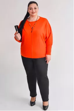 Брюки завужені в чорному кольорі з невеликими розрізами великих розмірів