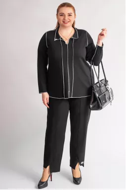 Брюки завужені в чорному кольорі з декоративними розрізами великих розмірів