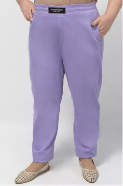 Джинсы бананы сиреневого цвета батал