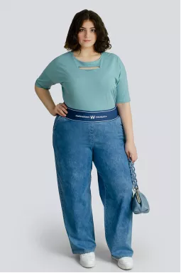 Джинсы в принт рептилия больших размеров