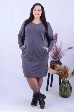 Зручна однотонна сукня міді батал