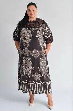 Сукня з мереживним оздобленням і орнаментом у теплих тонах великих розмірів