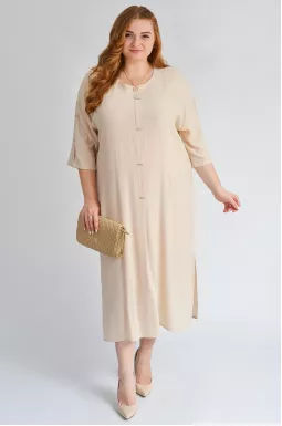 Лаконічна сукня міді з декоративними елементами великих розмірів