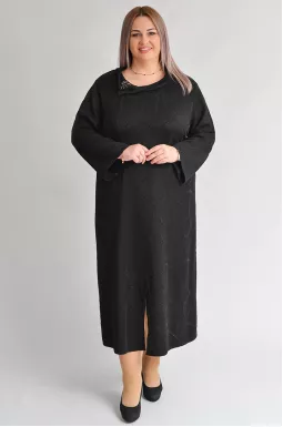 Чорна сукня з делікатним люрексовим мерехтінням і декоративною брошкою великих розмірів