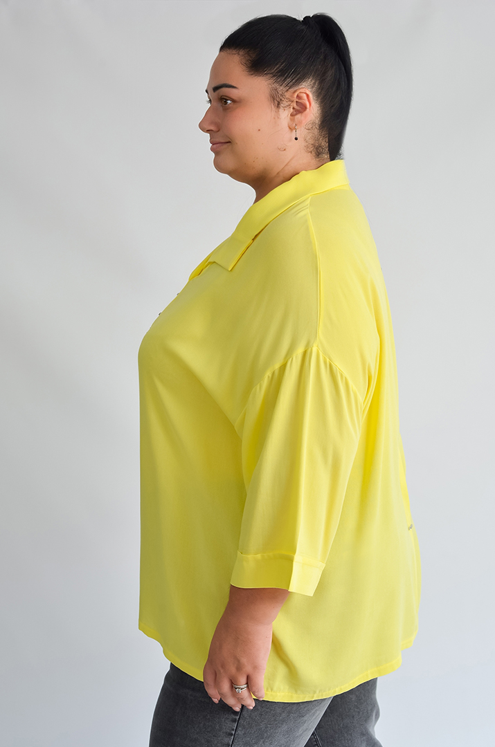 Блуза довга зі штапелю з декоративними елементами великих розмірів