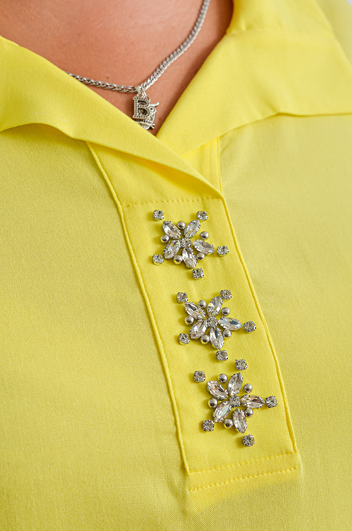 Блуза довга зі штапелю з декоративними елементами великих розмірів