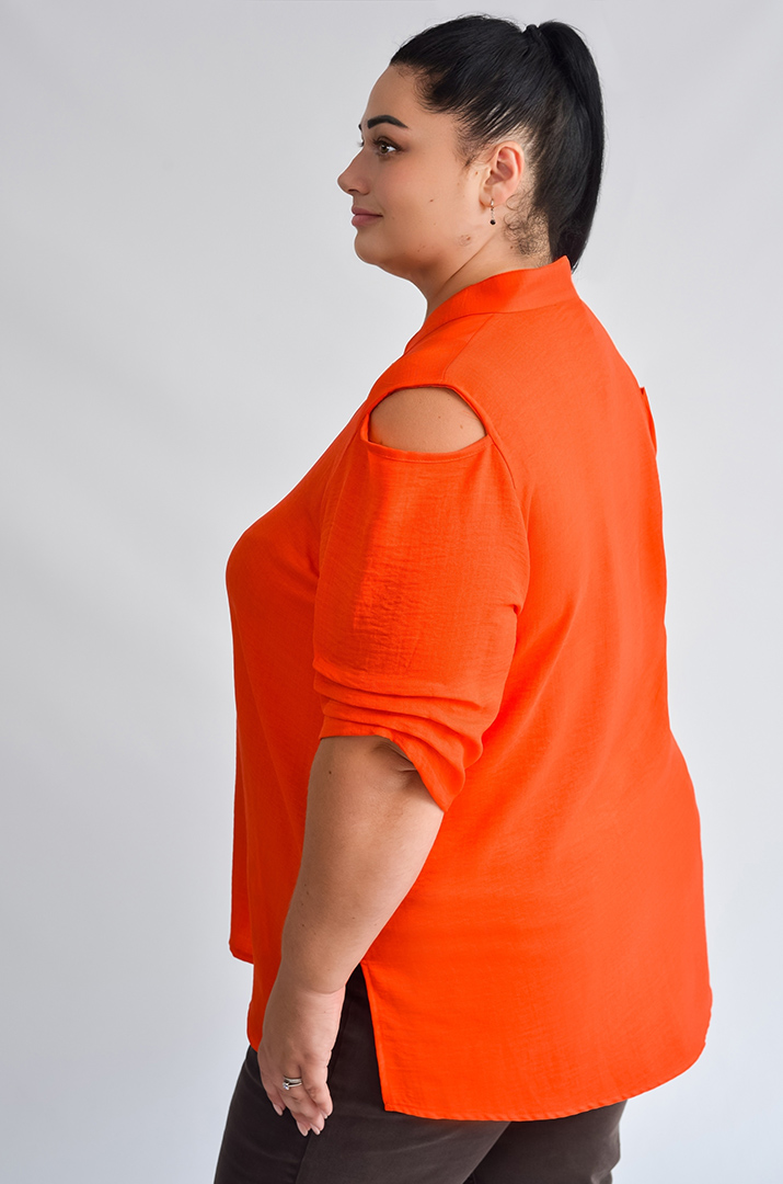 Довга блуза з фактурної тканини з декоративними камінцями великих розмірів