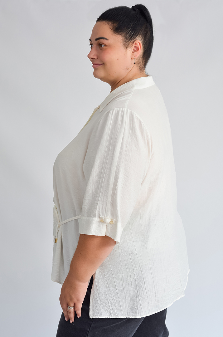 Довга блуза з декоративною зборкою великих розмірів