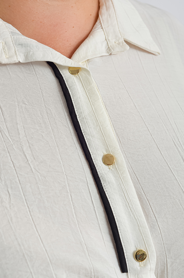 Довга блуза з декоративною зборкою великих розмірів