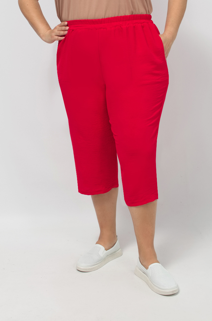 Капрі однотонні із жатки великих розмірів