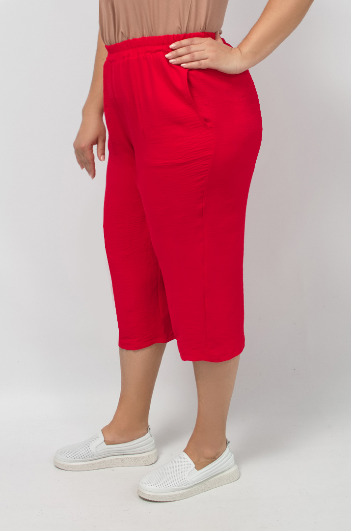 Капрі однотонні із жатки великих розмірів