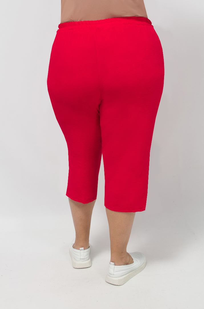 Капрі однотонні із жатки великих розмірів