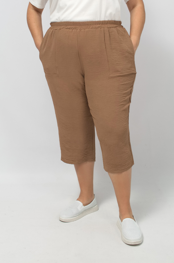 Капрі однотонні із жатки великих розмірів