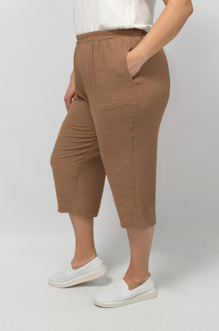 Капрі однотонні із жатки великих розмірів