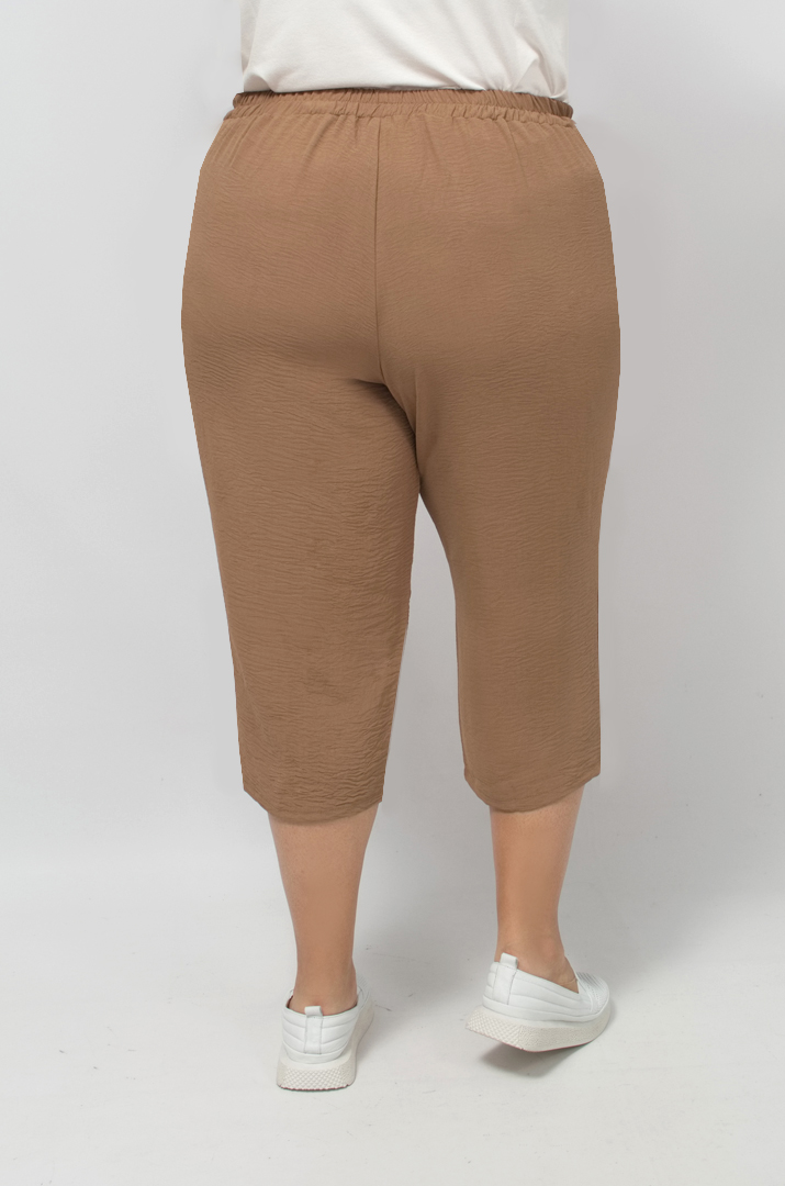 Капрі однотонні із жатки великих розмірів