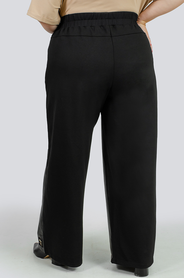 Брюки широкі трикотаж та шкіра великих розмірів