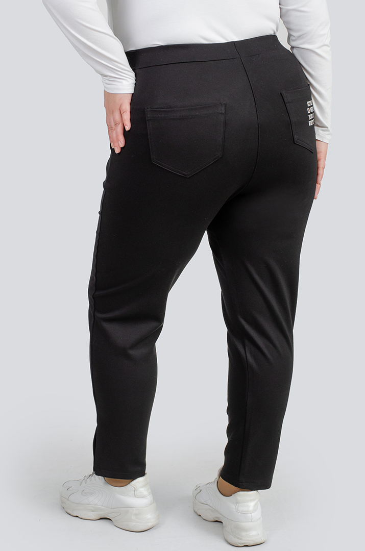 Чорно-білі завужені брюки великих розмірів