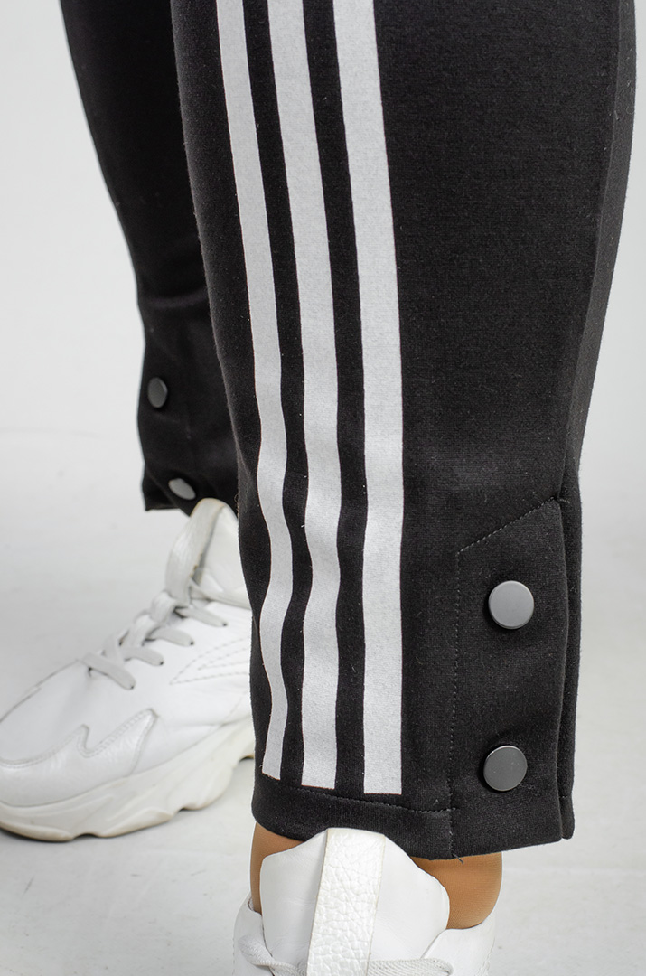 Чорно-білі завужені брюки великих розмірів