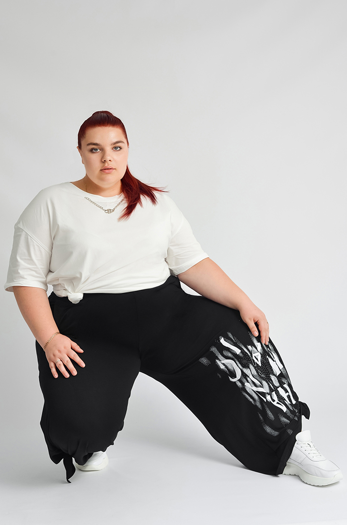 Брюки палаццо з художнім принтом і регульованим низом великих розмірів