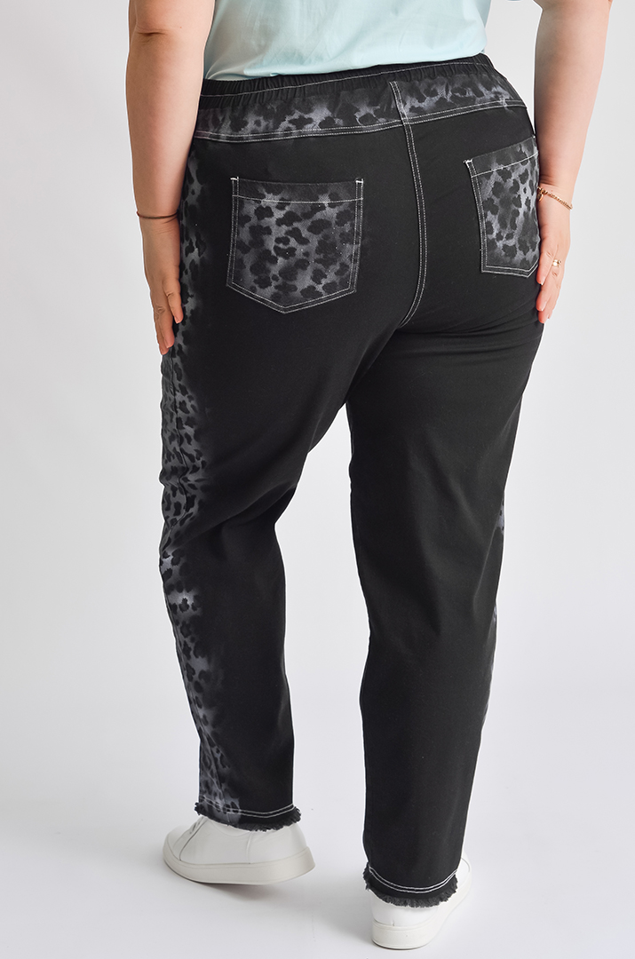 Джинси завужені з леопардовим принтом великих розмірів