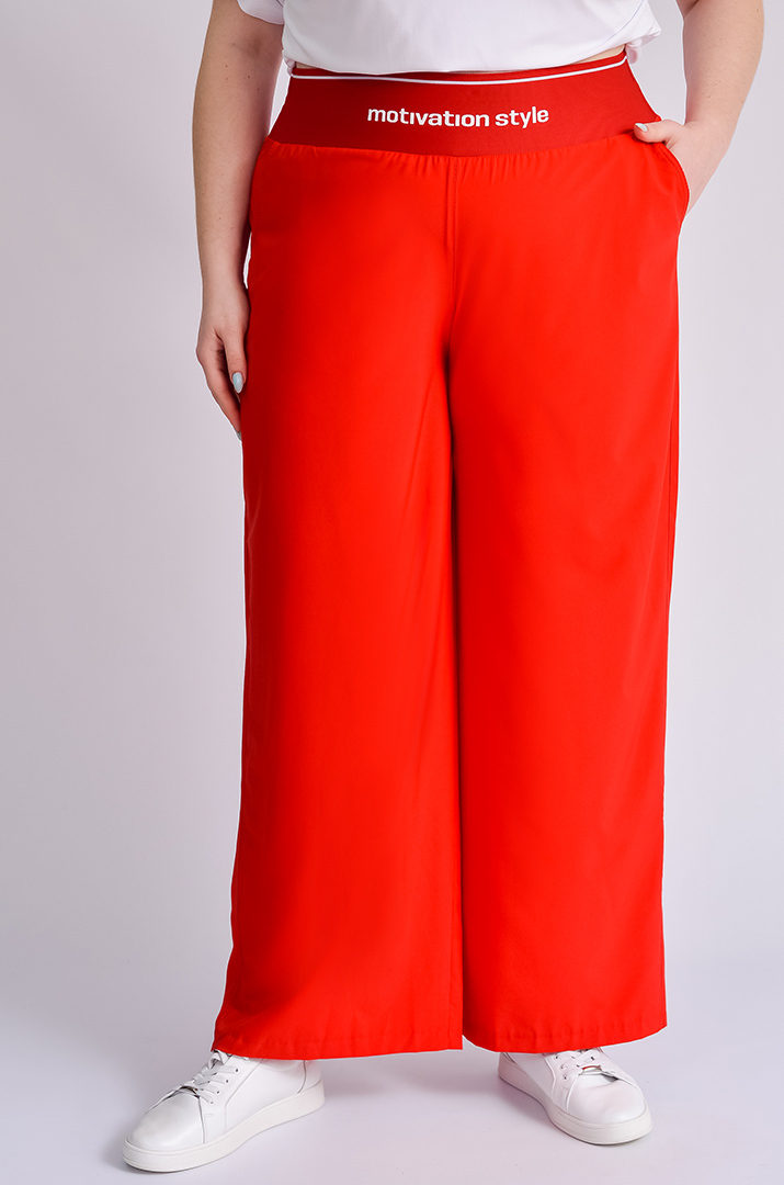 Брюки широкі в різних кольорах великих розмірів