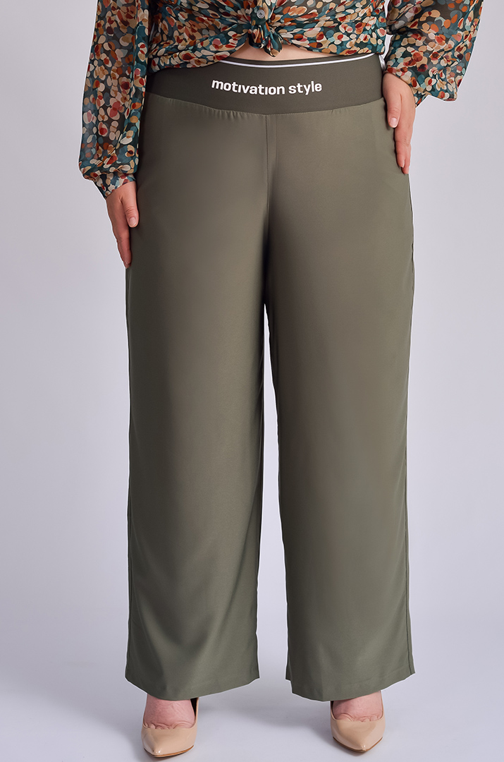 Брюки широкі в різних кольорах великих розмірів