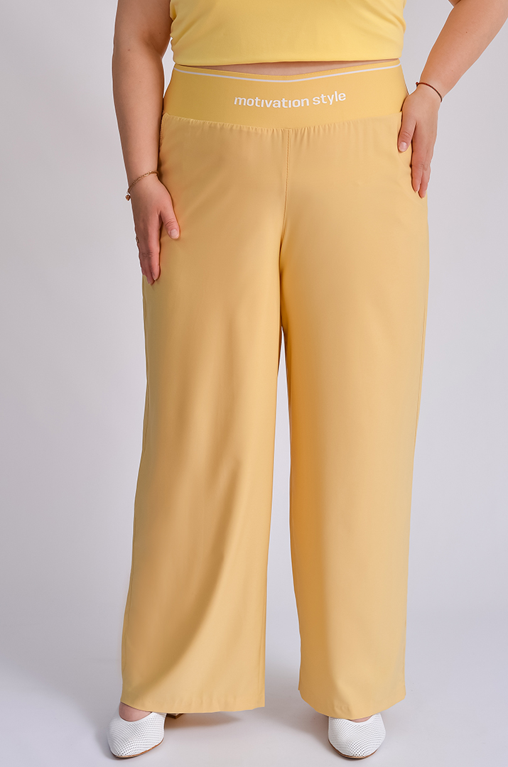 Брюки широкі в різних кольорах великих розмірів