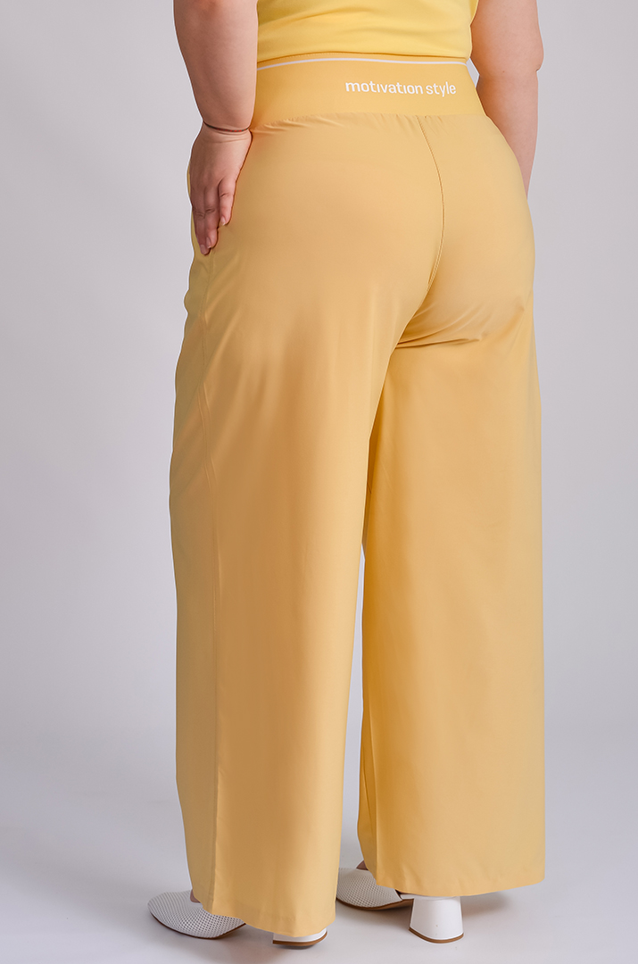 Брюки широкі в різних кольорах великих розмірів