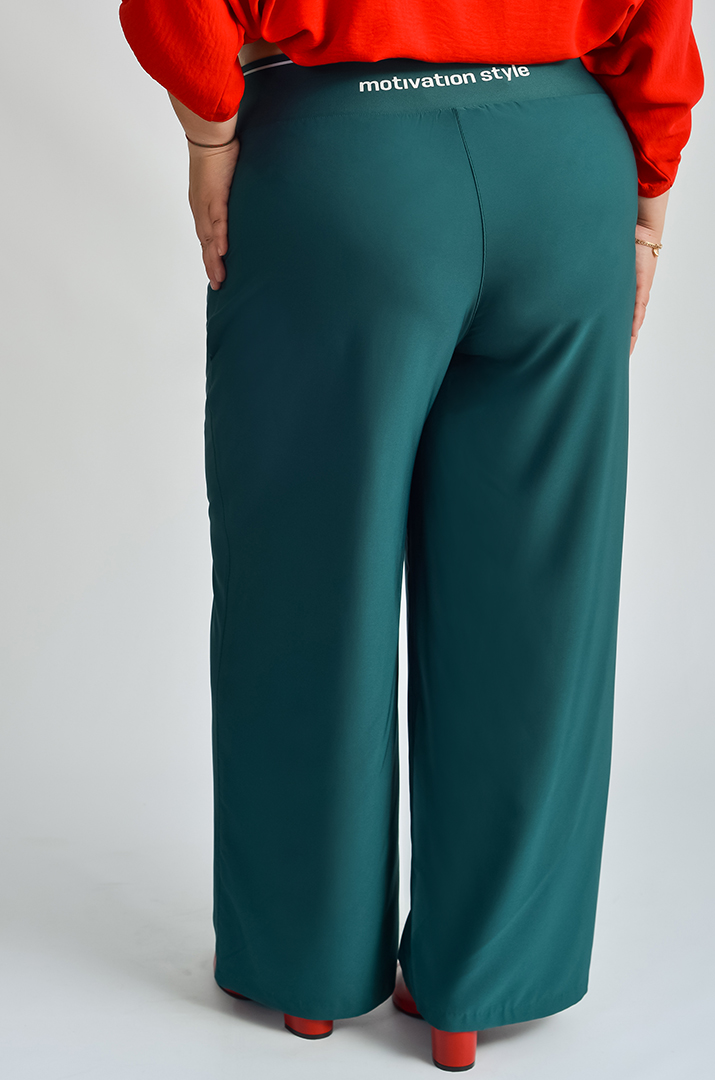 Брюки широкі в різних кольорах великих розмірів