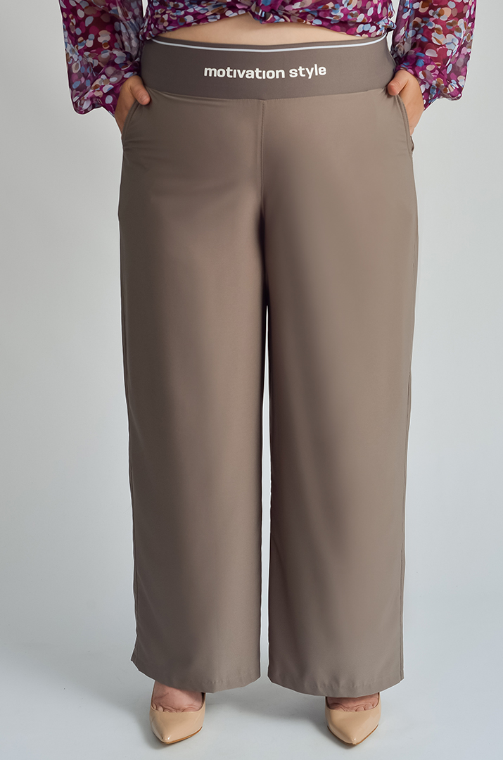 Брюки широкі в різних кольорах великих розмірів
