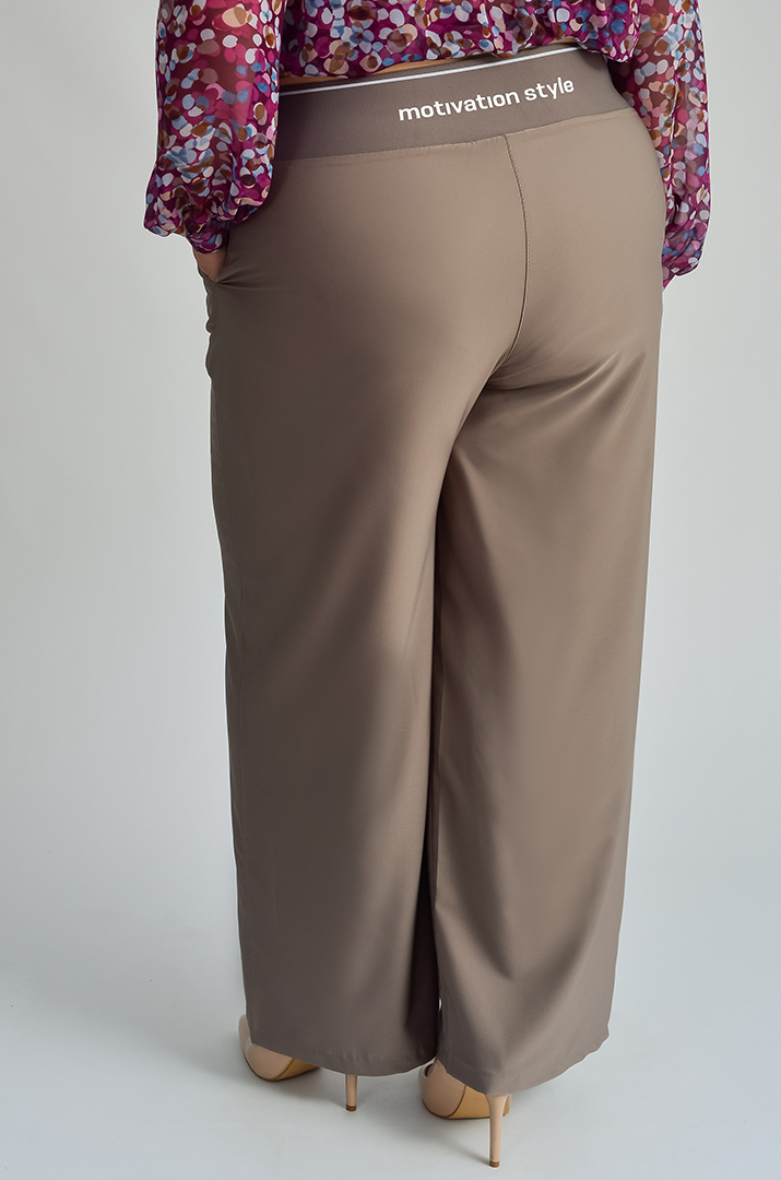 Брюки широкі в різних кольорах великих розмірів