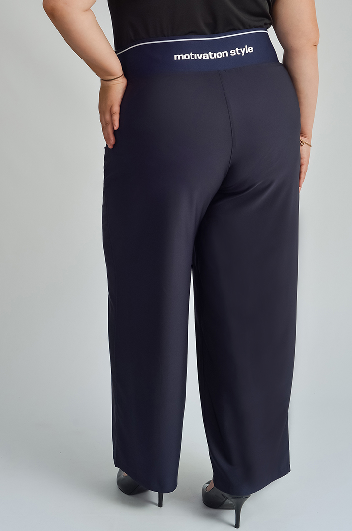 Брюки широкі в різних кольорах великих розмірів