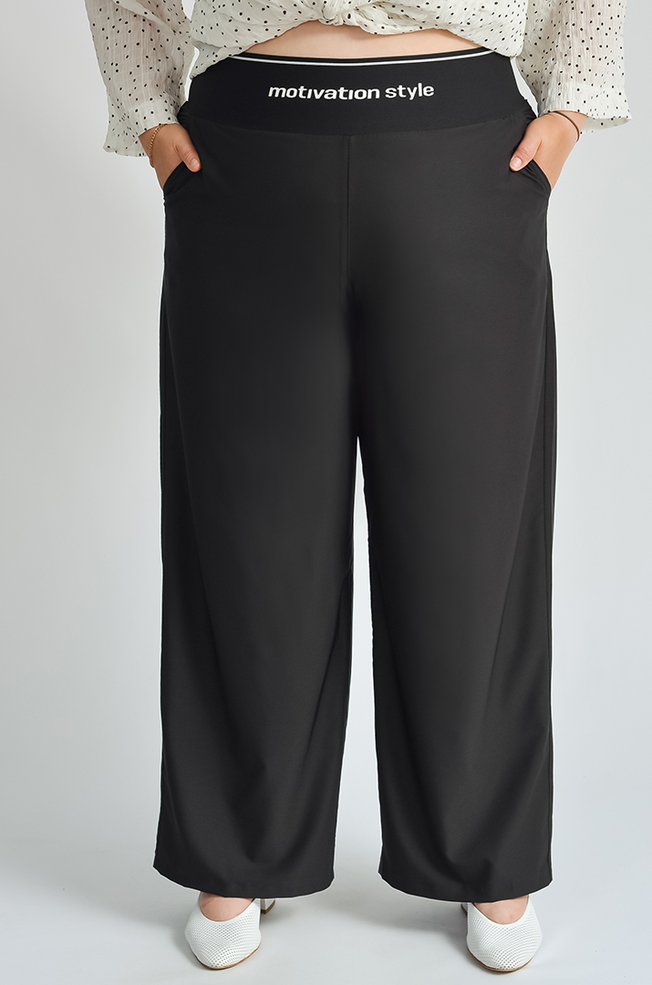 Брюки широкі в різних кольорах великих розмірів