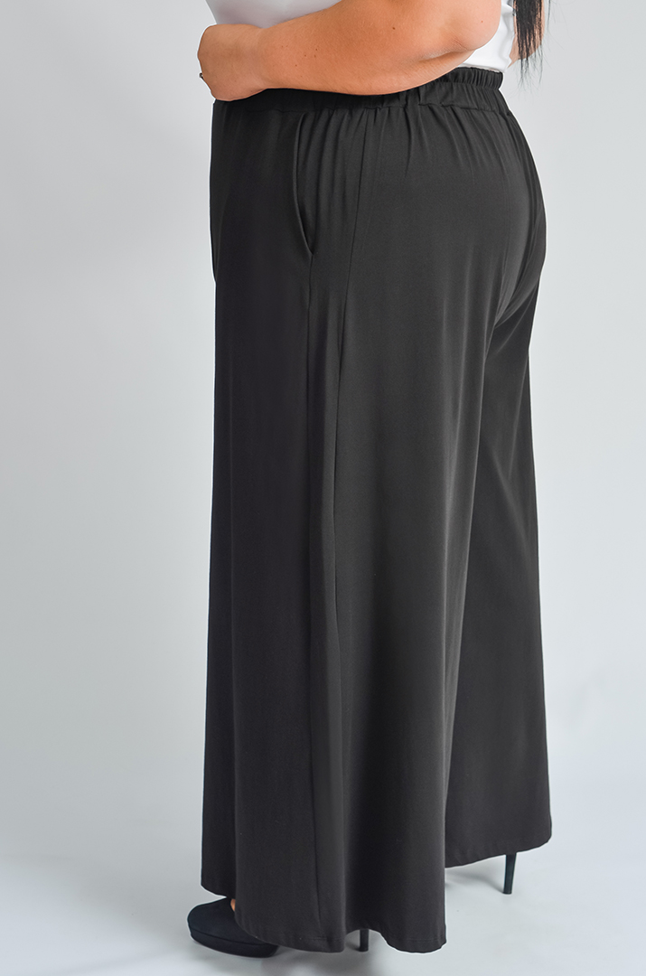 Однотонні брюки палаццо з кишенями великих розмірів