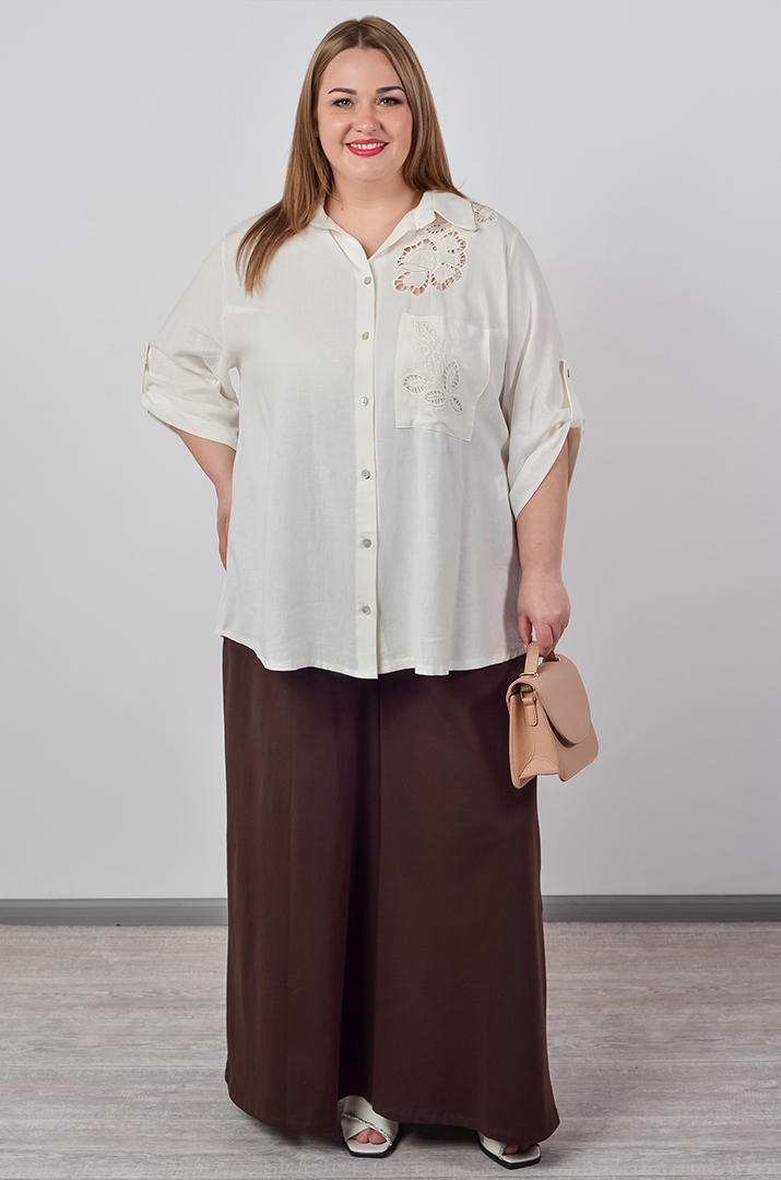 Однотонні брюки палаццо з кишенями великих розмірів