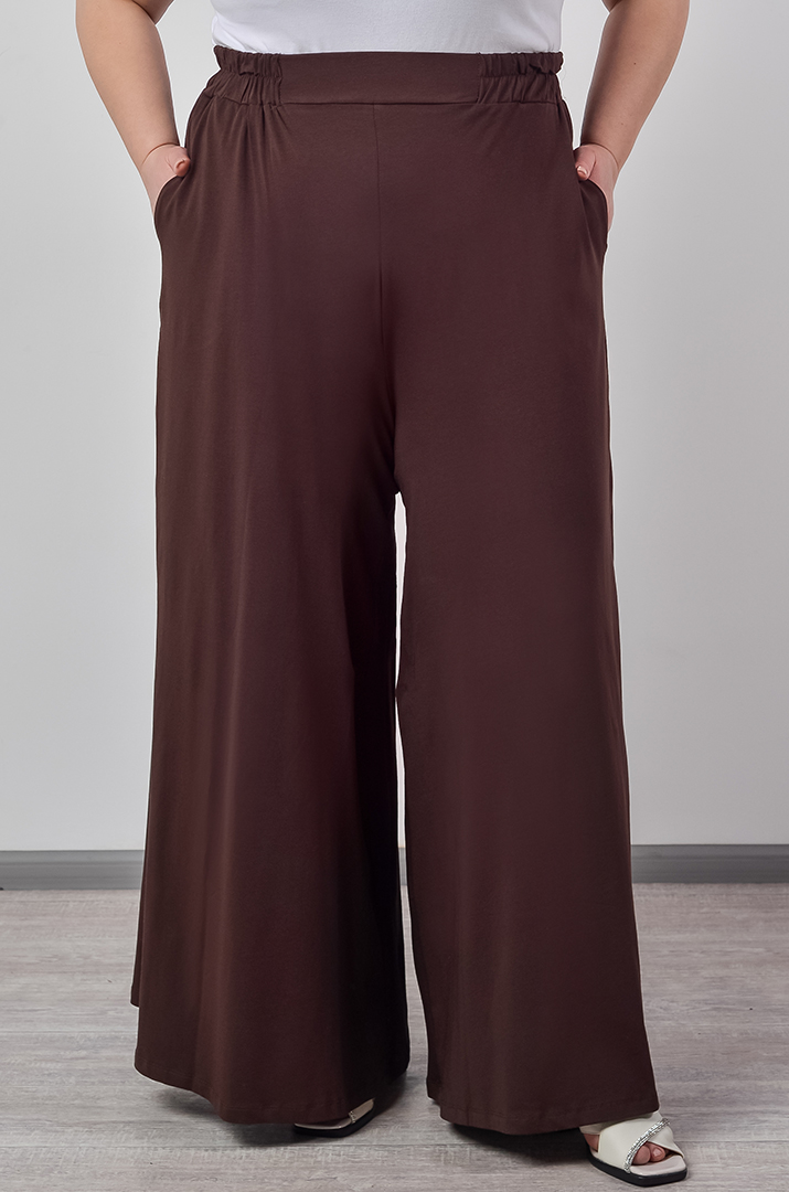 Однотонні брюки палаццо з кишенями великих розмірів