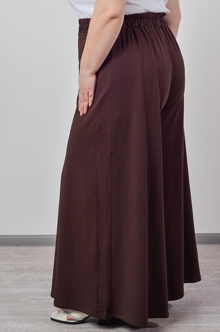 Однотонні брюки палаццо з кишенями великих розмірів