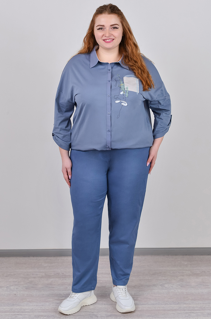 Завужені джинси з еластичним поясом і декоративним ґудзиком великих розмірів