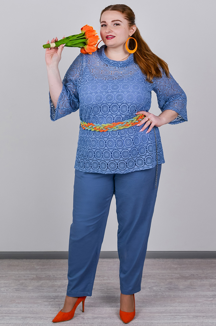 Завужені джинси з еластичним поясом і декоративним ґудзиком великих розмірів