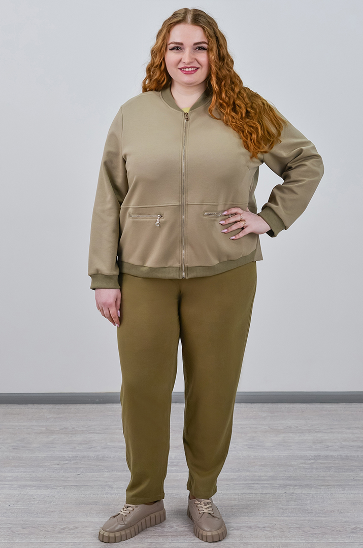 Завужені джинси з еластичним поясом і декоративним ґудзиком великих розмірів